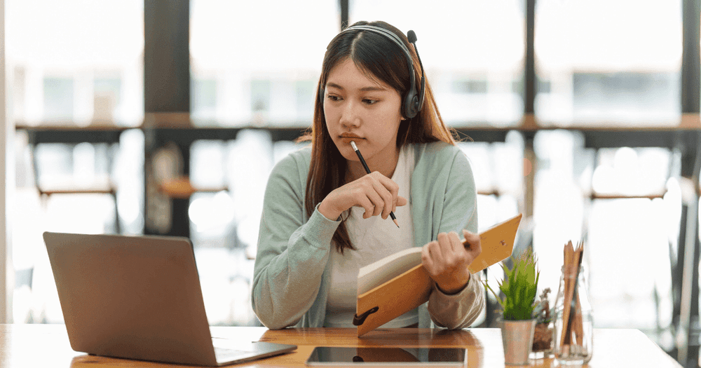 Student preparing for the Cambridge English exam based on her English level